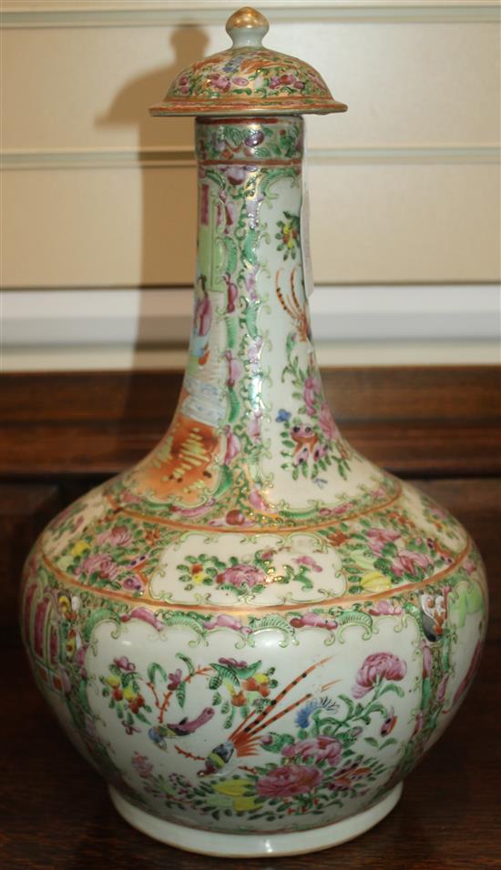 A  famille rose punch bowl and a similar bottle vase and cover